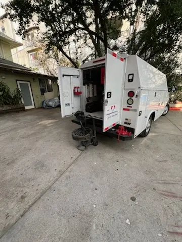 Magnet Plumbing service vehicle on-site for Sewer Line Repair in Mid-City
